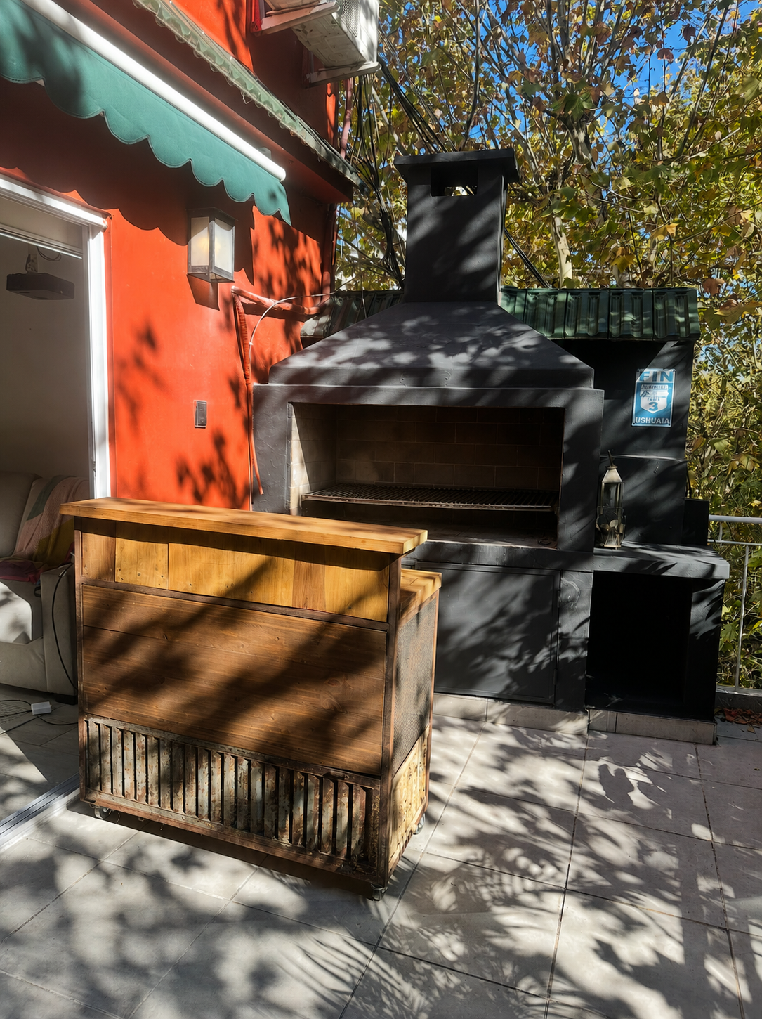 Argentine parrilla grill with glowing embers