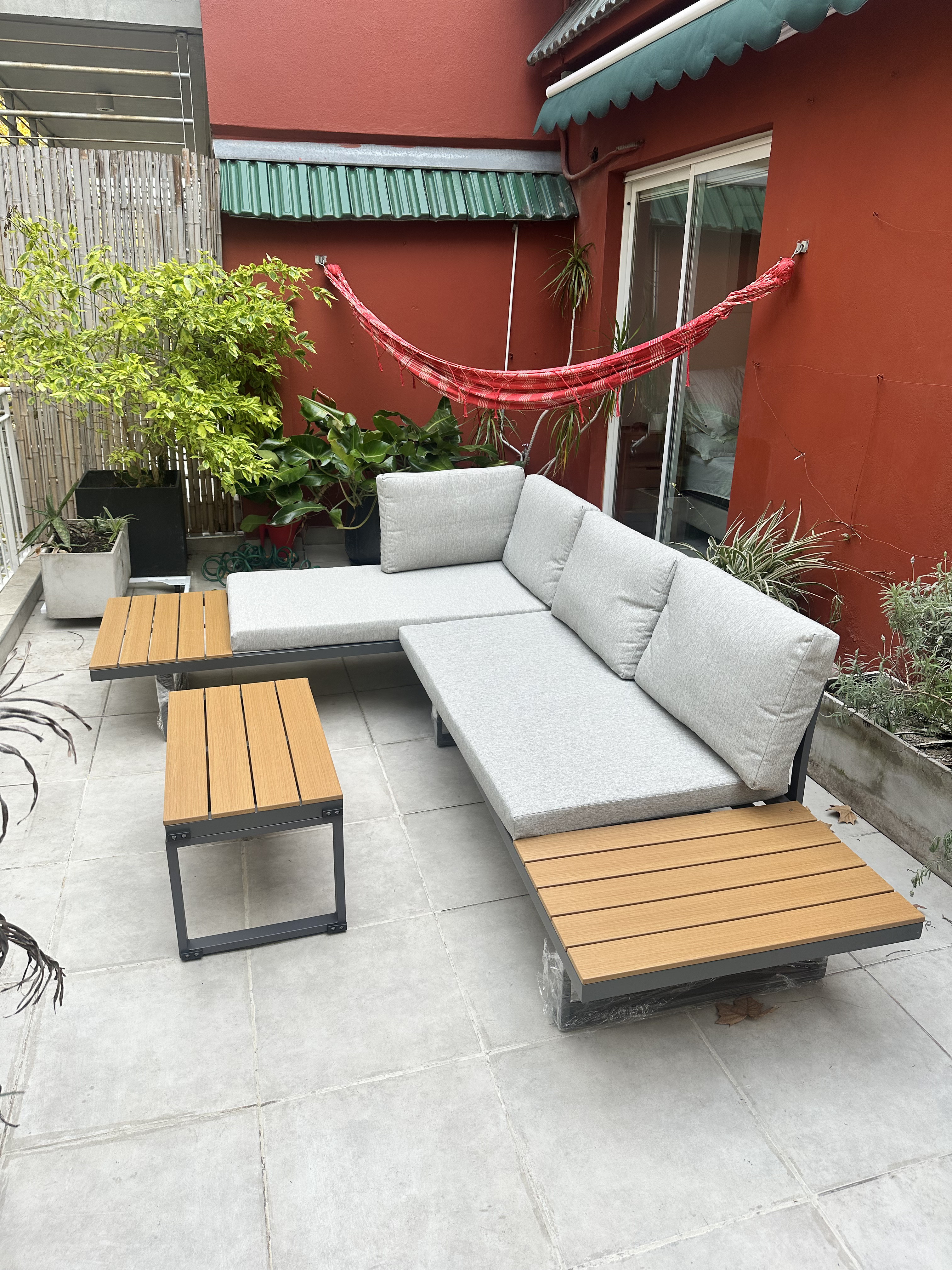 Terrace with parrilla and ivy walls