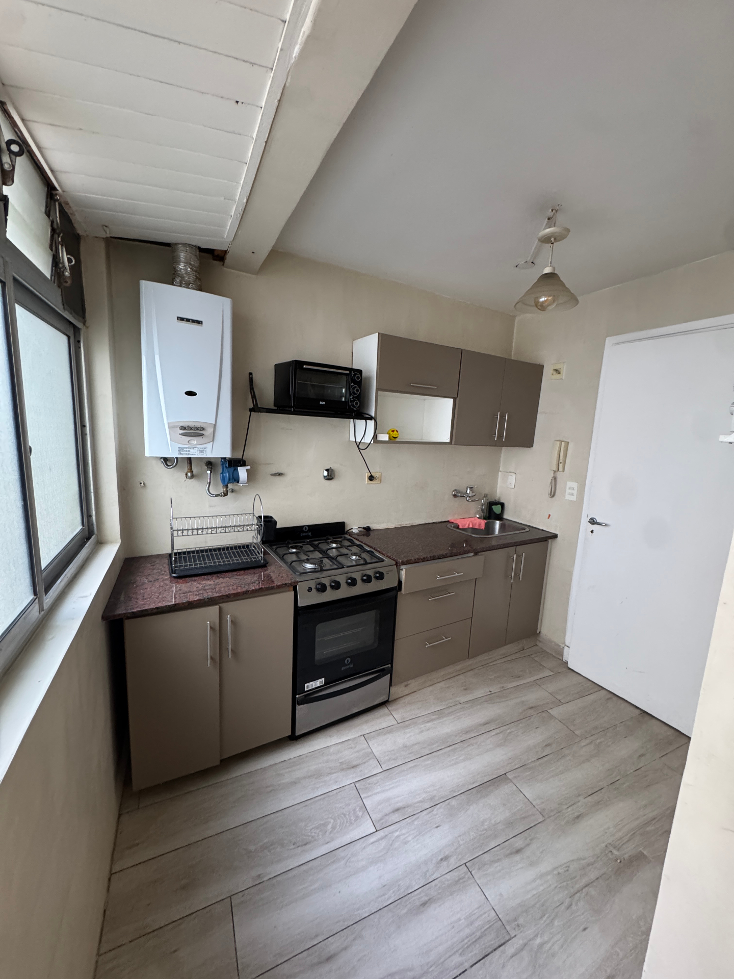 Kitchen with butcher block and brass